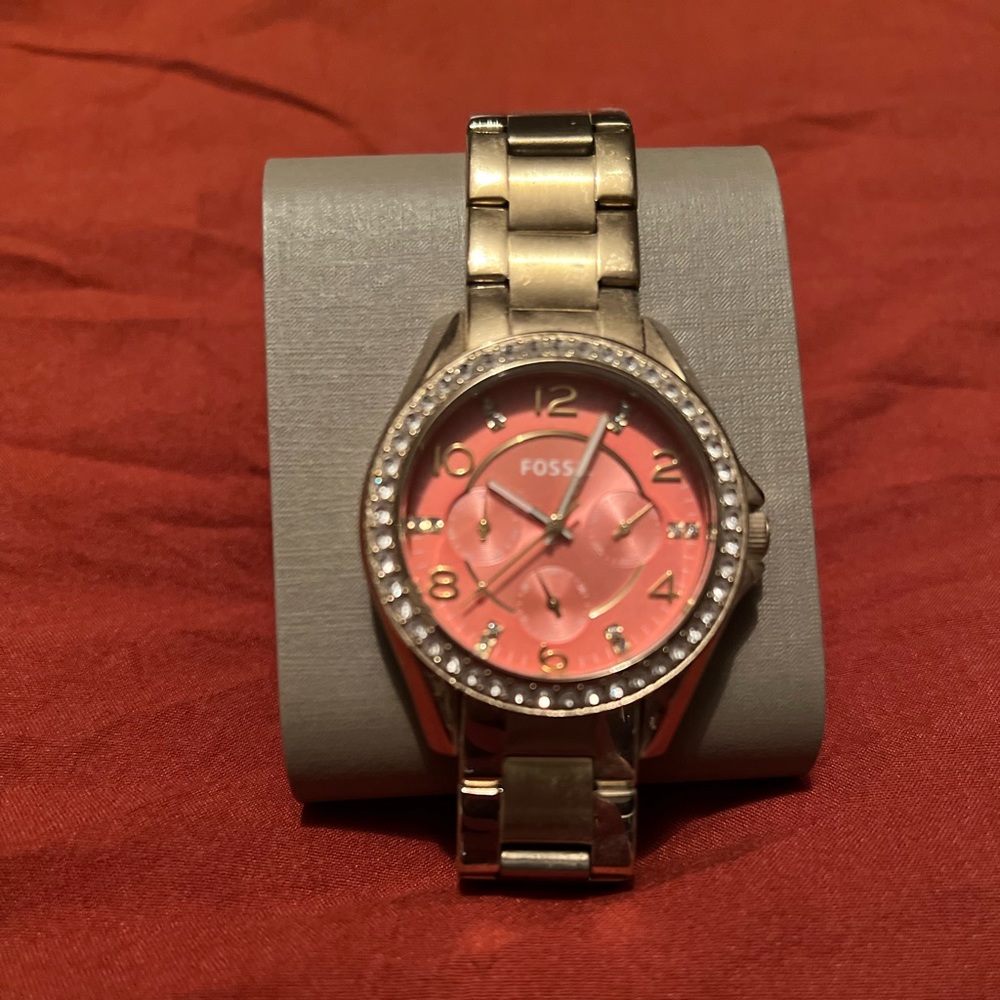 Salmon/gold fossil watch